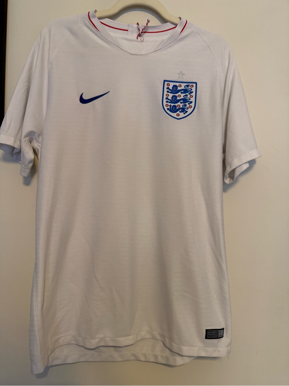 Nike Men’s England White Football Jersey with Blue Accents